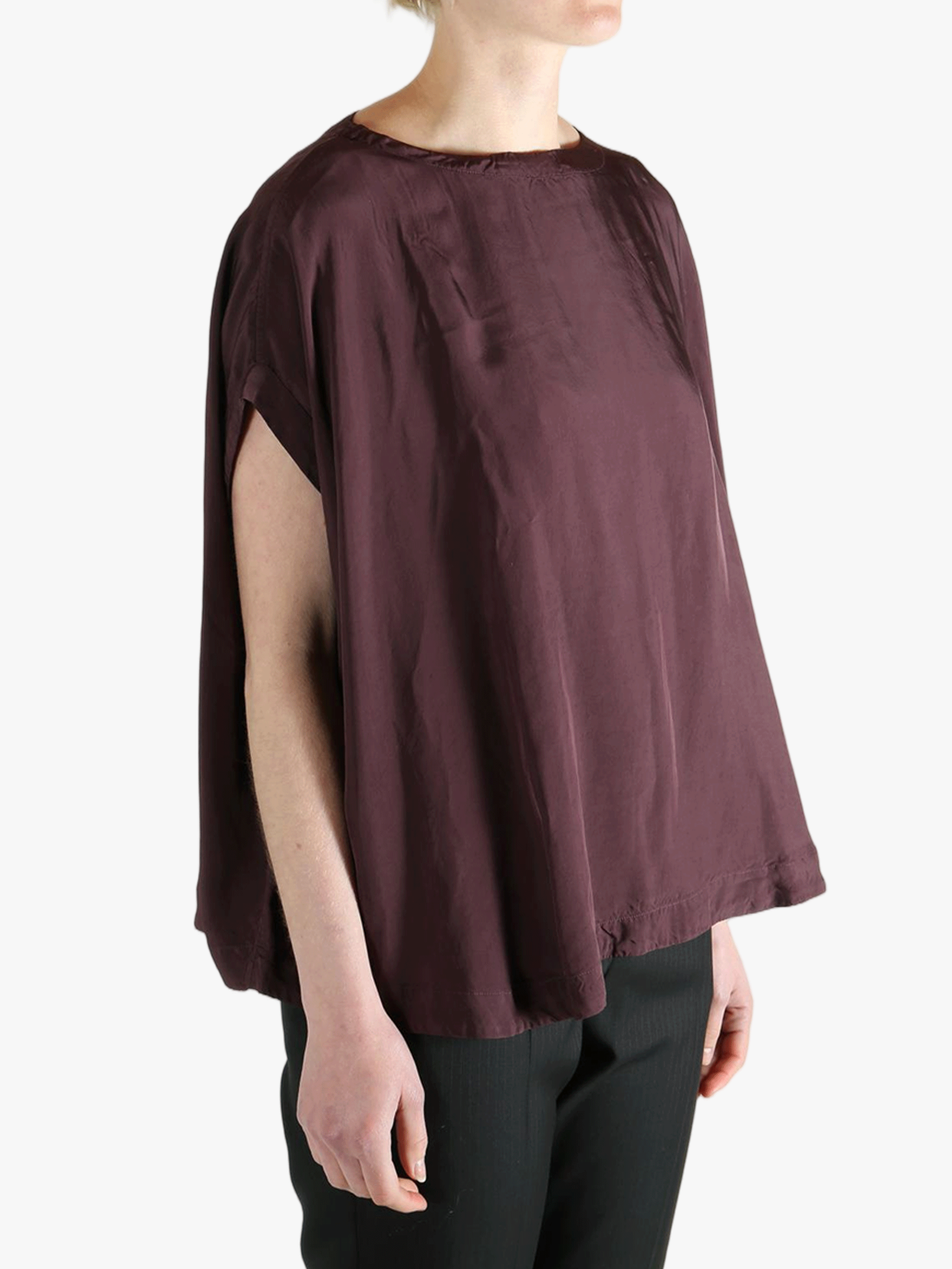 Burgundy top worn by a person, showing the top's fit
