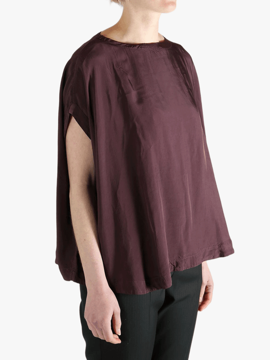 Burgundy top worn by a person, showing the top's fit