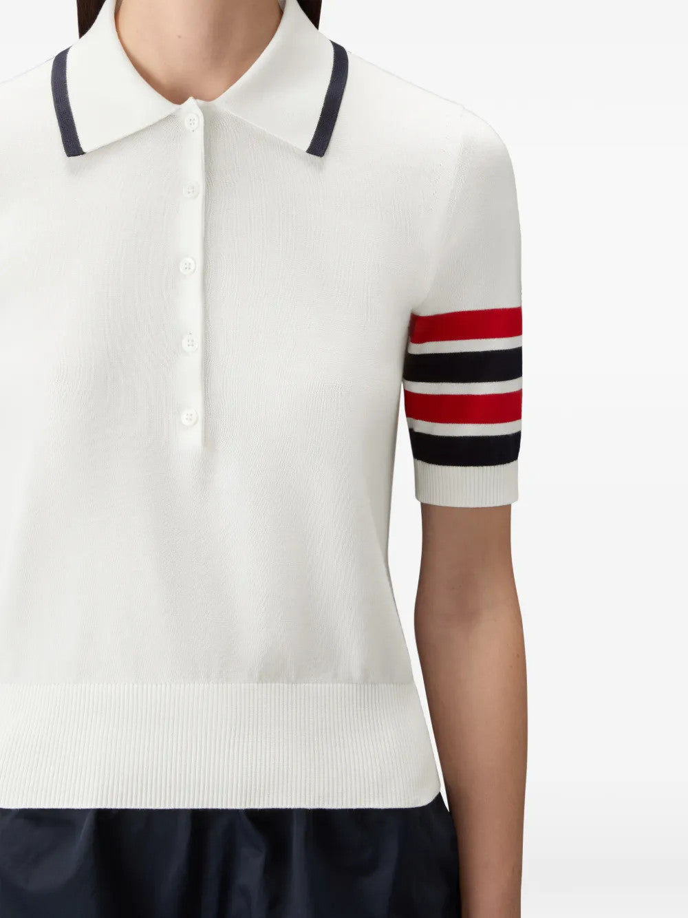 White shirt worn by a person, showing the shirt fit