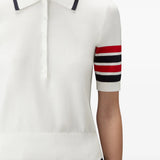 White shirt worn by a person, showing the shirt fit