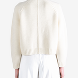 Tan knitwear, full body view
