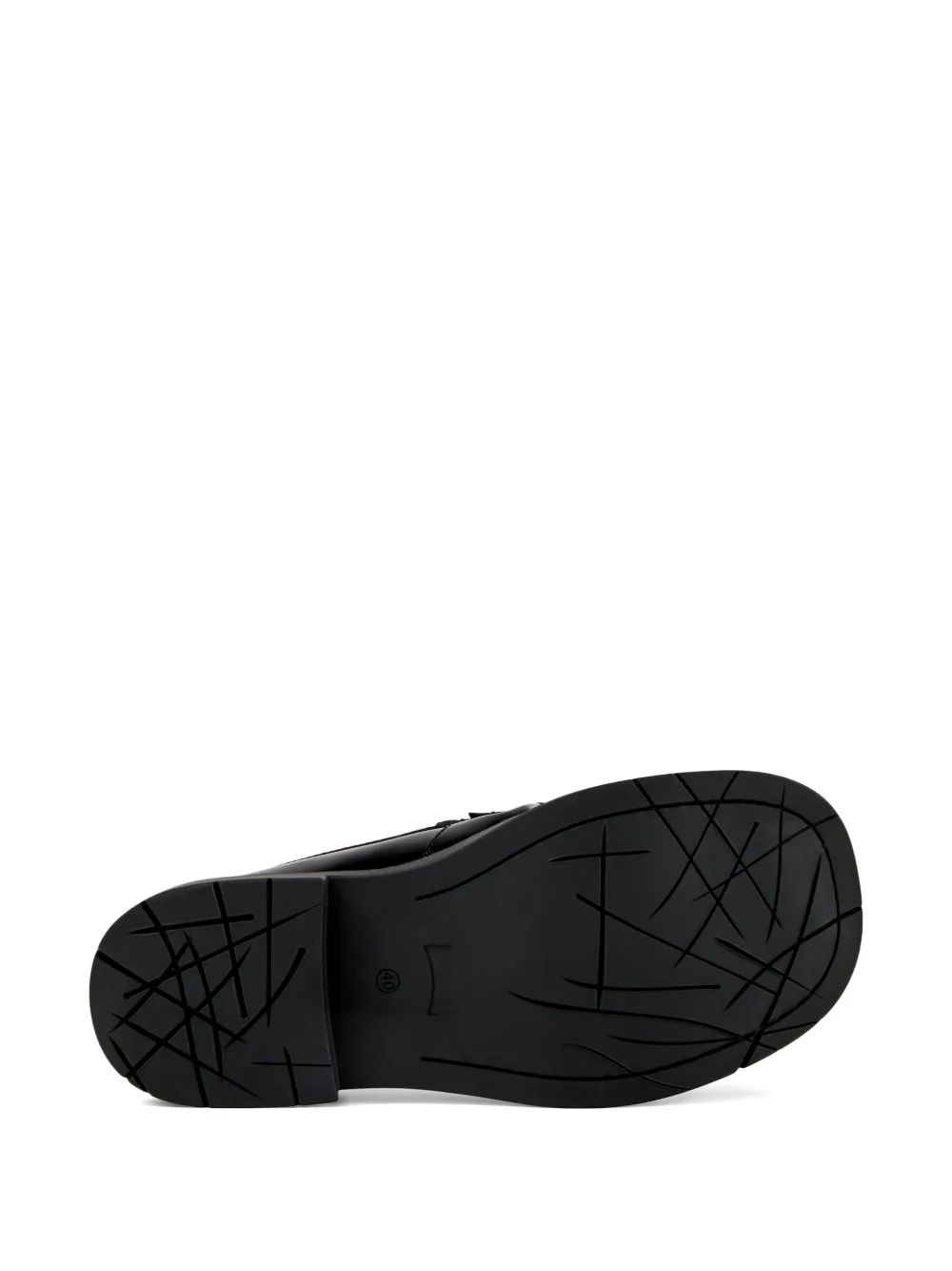 Close up of loafers-mules, showing texture of the calfskin fabric