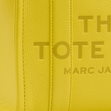 Close up of Yellow bags, showing texture of the calf leather fabric