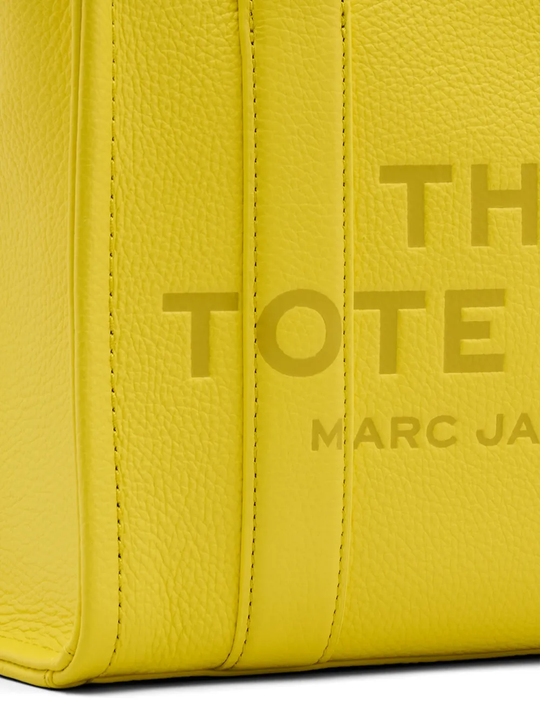 Close up of Yellow bags, showing texture of the calf leather fabric