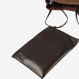 Close up of the black pocket, showing texture of the leather fabric