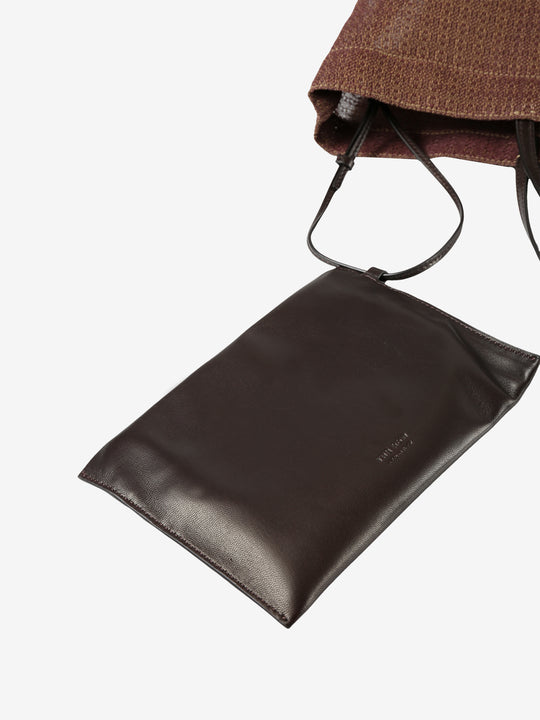 Close up of the black pocket, showing texture of the leather fabric