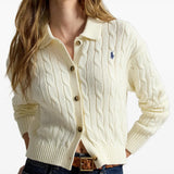 Tan knitwear worn by a person, showing the knitwear fit