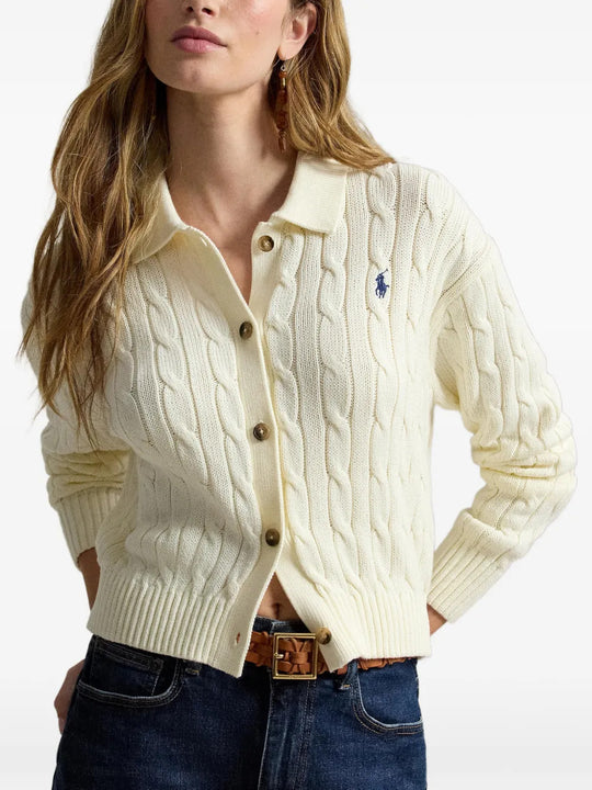Tan knitwear worn by a person, showing the knitwear fit