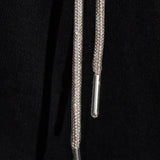 Close up of black pants, showing texture of the cotton fabric