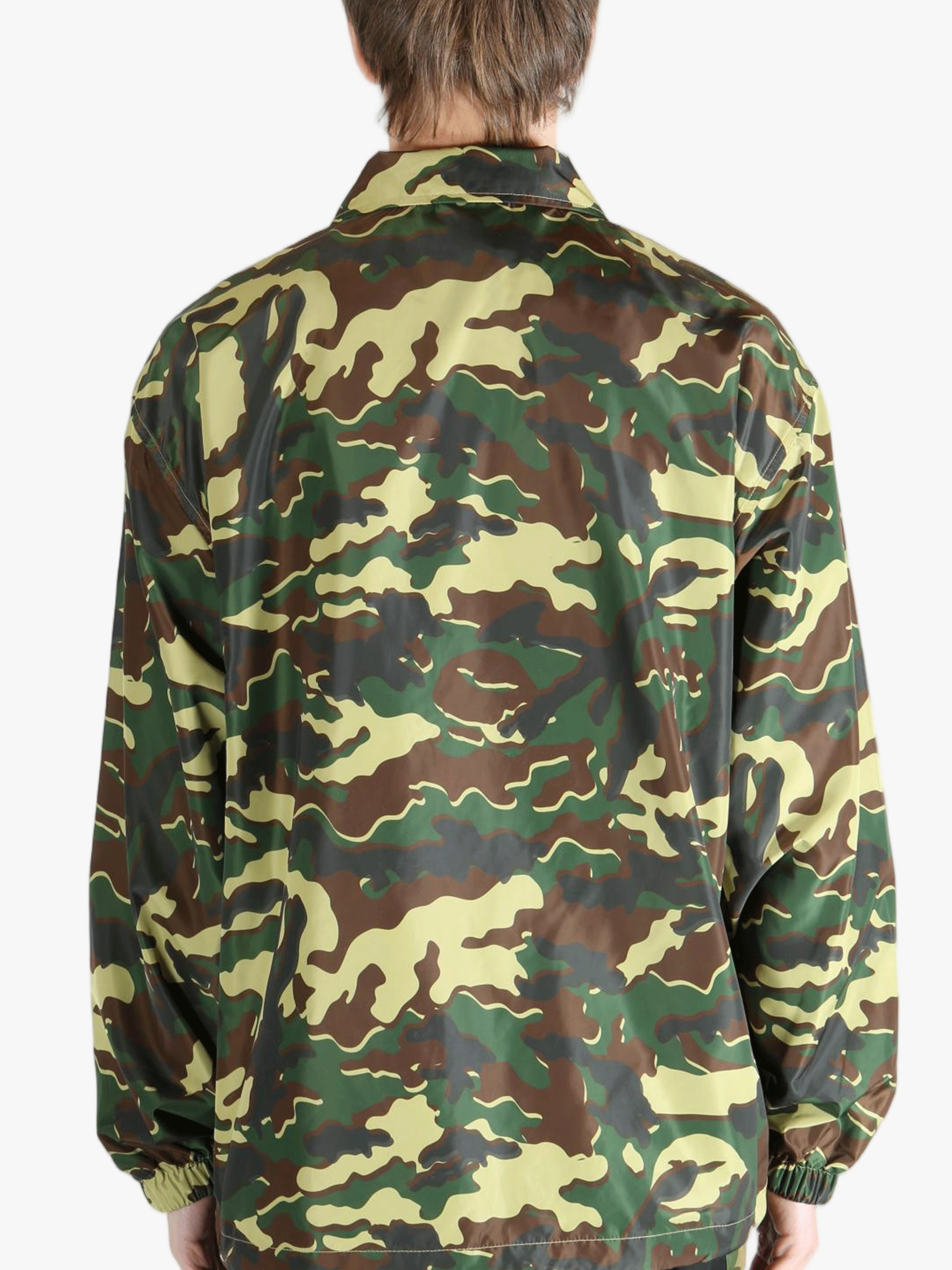 Green jacket worn by a person,showing the jacket's fit