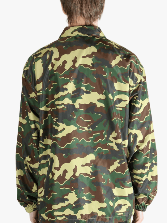 Green jacket worn by a person,showing the jacket's fit