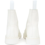 White boots, back view