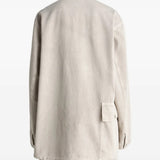 White shirt worn by a person, showing the shirt's fit