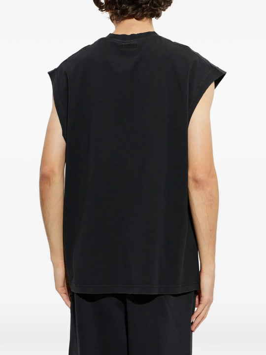 Black t-shirt worn by a person, showing the t-shirt fit