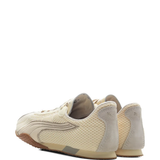 Tan shoes, side view