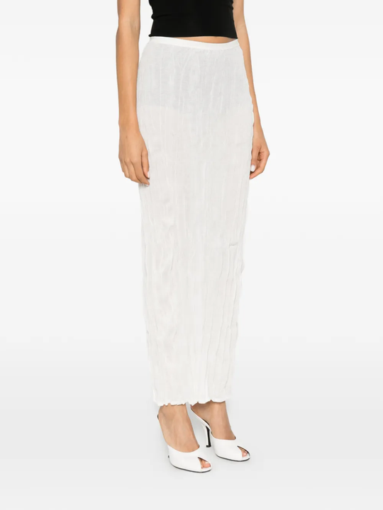 White skirts worn by a person, showing the skirts's fit