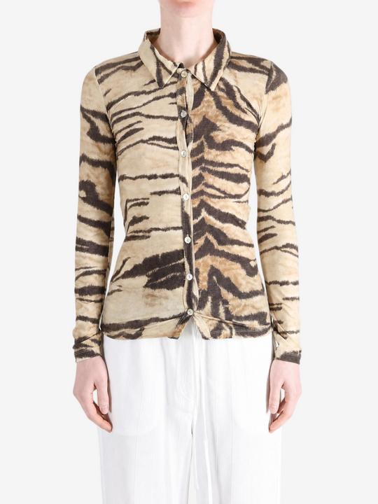 Tan shirt worn by a person, showing the shirt fit
