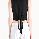 Black jacket worn by a person, showing the jacket fit