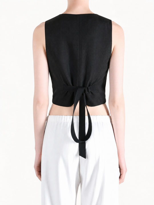 Black jacket worn by a person, showing the jacket fit