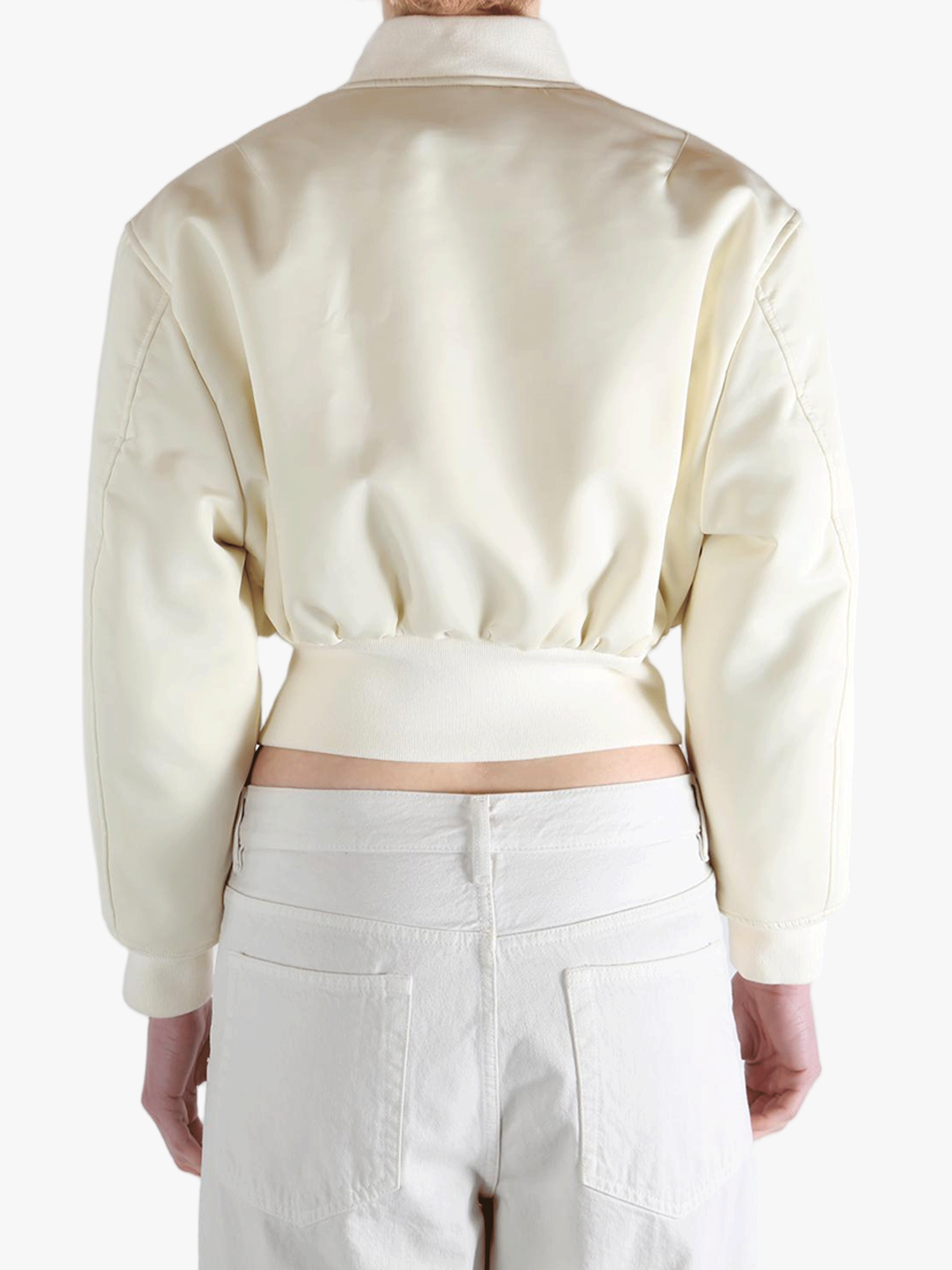 White jackets worn by a person, showing the jackets fit