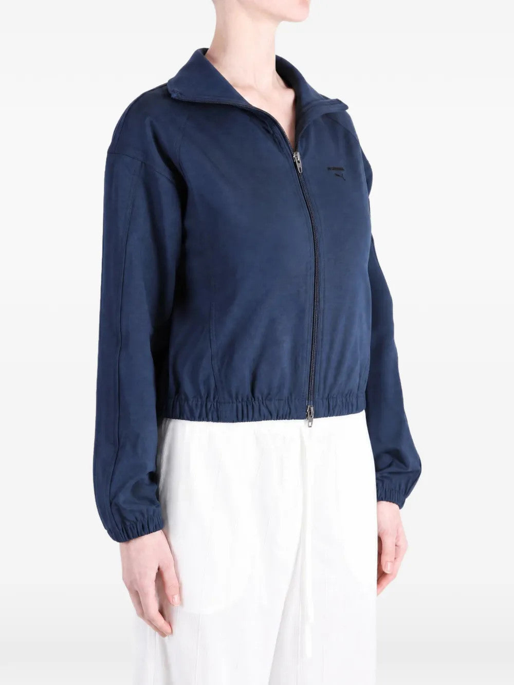Navy jacket worn by a person, showing the jacket fit