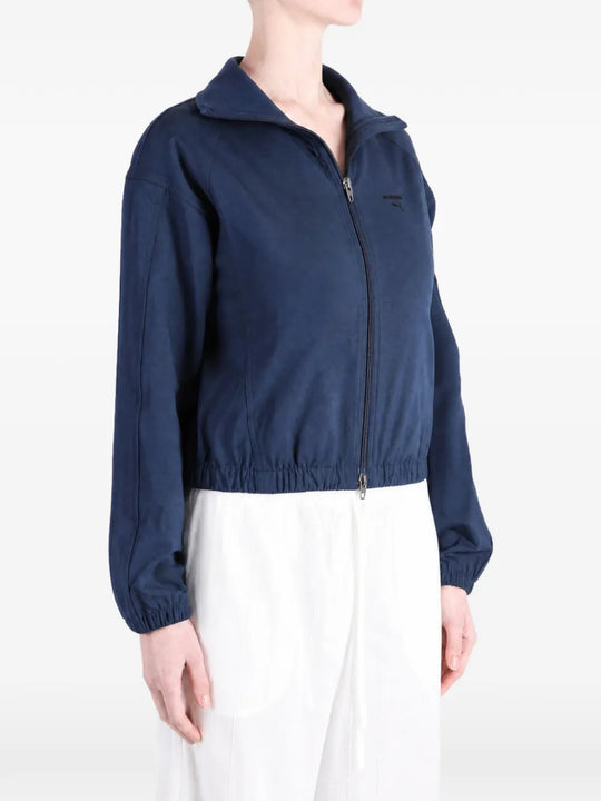 Navy jacket worn by a person, showing the jacket fit