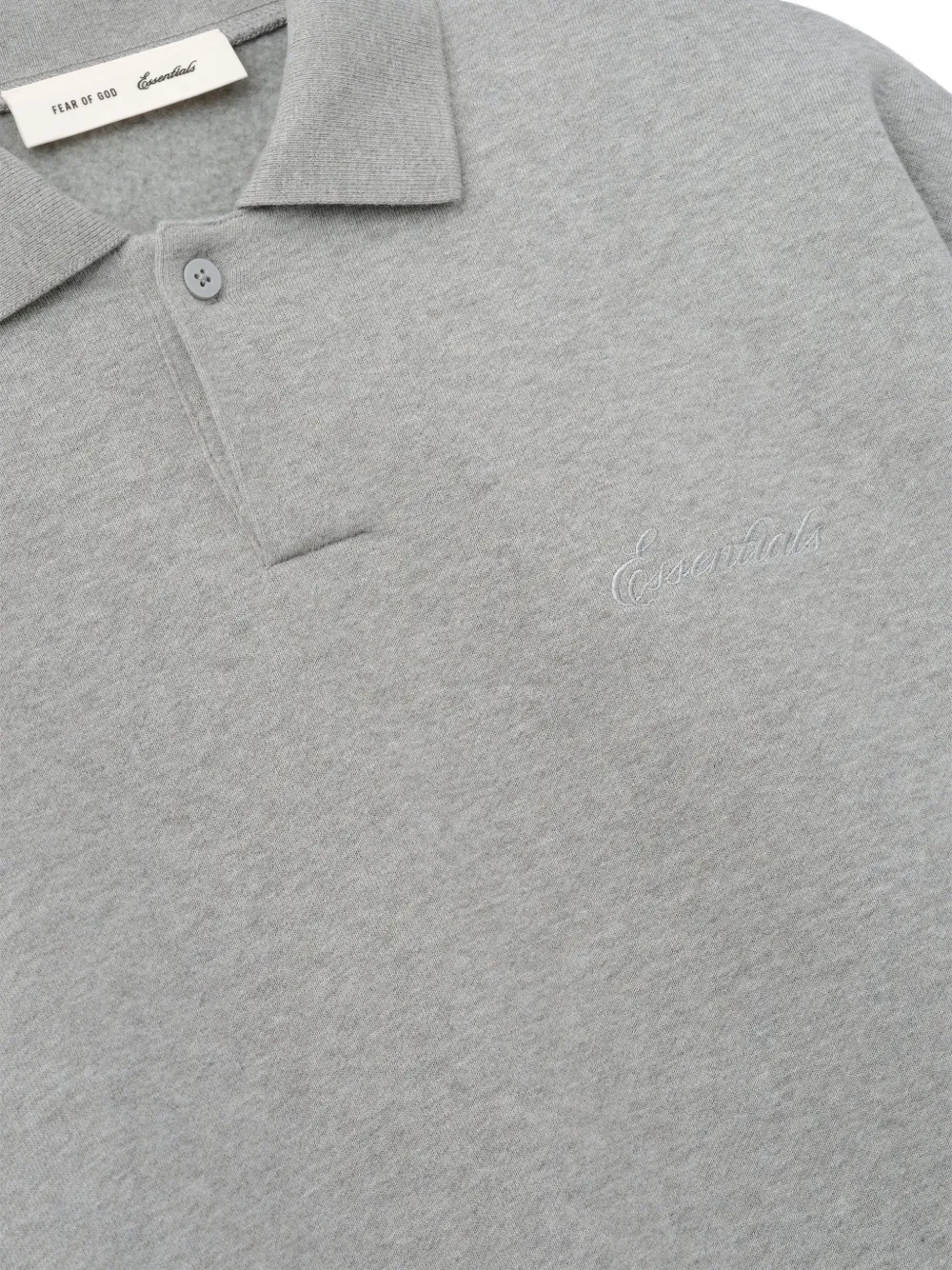Close up of grey shirt, showing texture of the cotton fabric