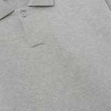 Close up of grey shirt, showing texture of the cotton fabric