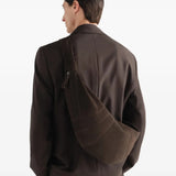 Brown bag worn by a person, showing the bag fit