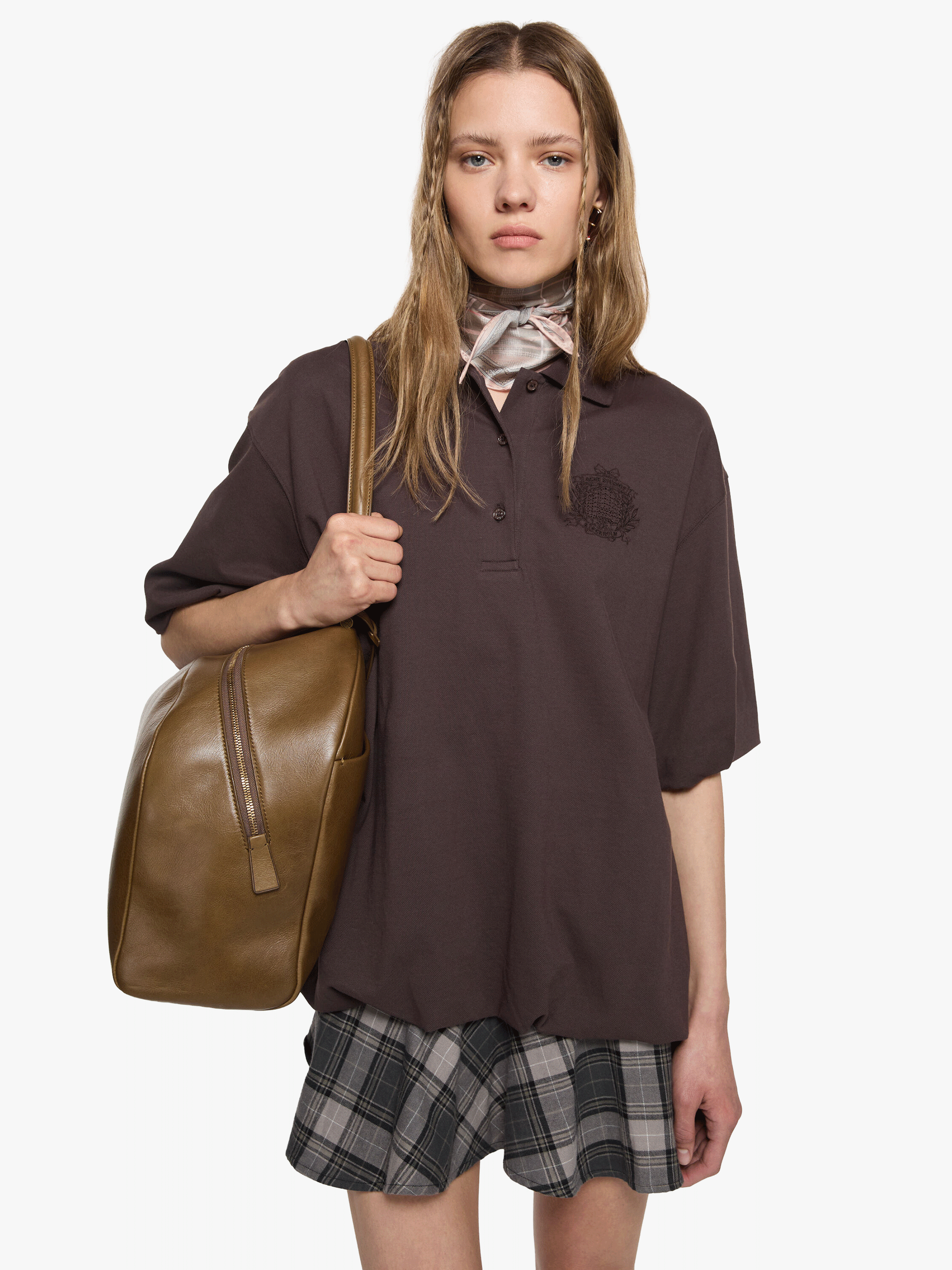 Brown dress worn by a person, showing the dress fit