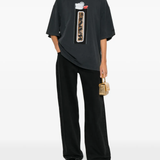 black t-shirts, full body view