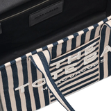 Close up of blue bag, showing texture of the cotton fabric