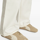 Tan shoes worn by a person, showing the shoes's fit