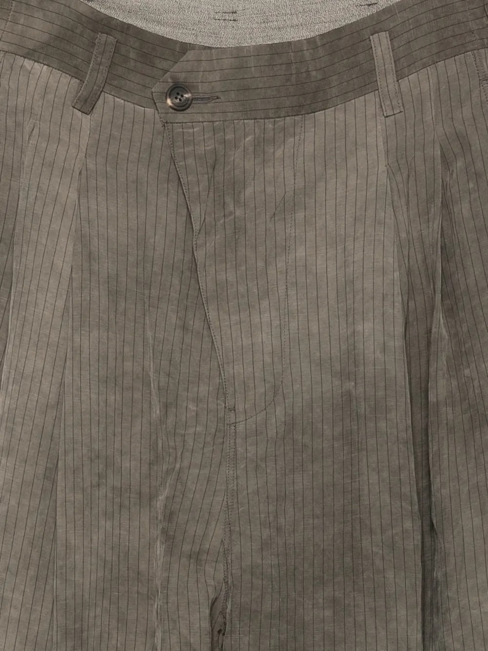 Close up of brown pants, showing texture of the linen fabric