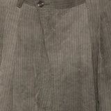 Close up of brown pants, showing texture of the linen fabric