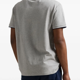 Grey T-shirt worn by a person, showing the T-shirt's fit