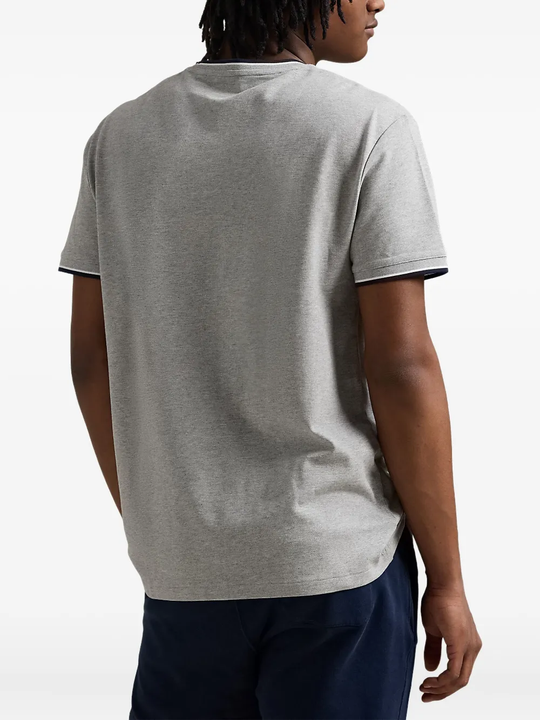 Grey T-shirt worn by a person, showing the T-shirt's fit