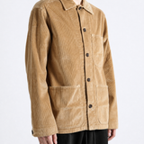 Tan jacket worn by a person, showing the jacket fit