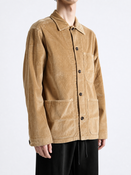 Tan jacket worn by a person, showing the jacket fit
