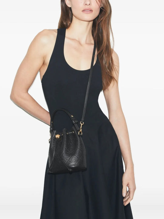 Black bag worn by a person, showing the bag's fit