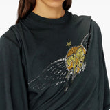 Black t-shirt worn by a person, showing the t-shirt fit