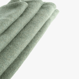 Close up of Green scarf, showing texture of the 100% cashmere fabric