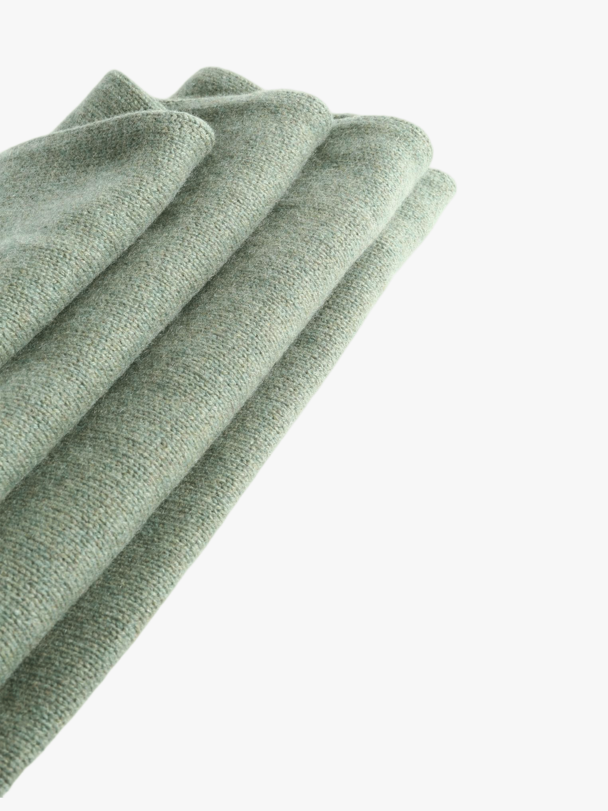 Close up of Green scarf, showing texture of the 100% cashmere fabric