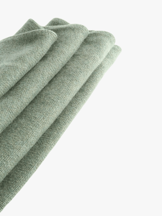 Close up of Green scarf, showing texture of the 100% cashmere fabric