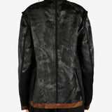 Black jacket worn by a person, showing the jacket's fit