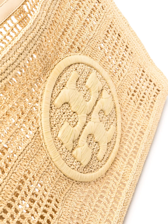 Close up of tan bags,showing texture of the straw fabric.