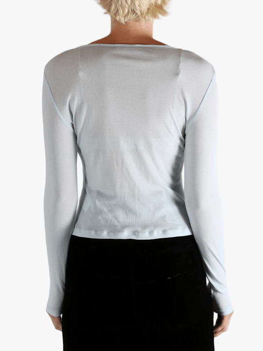 Blue shirt worn by a person, showing the shirt's fit