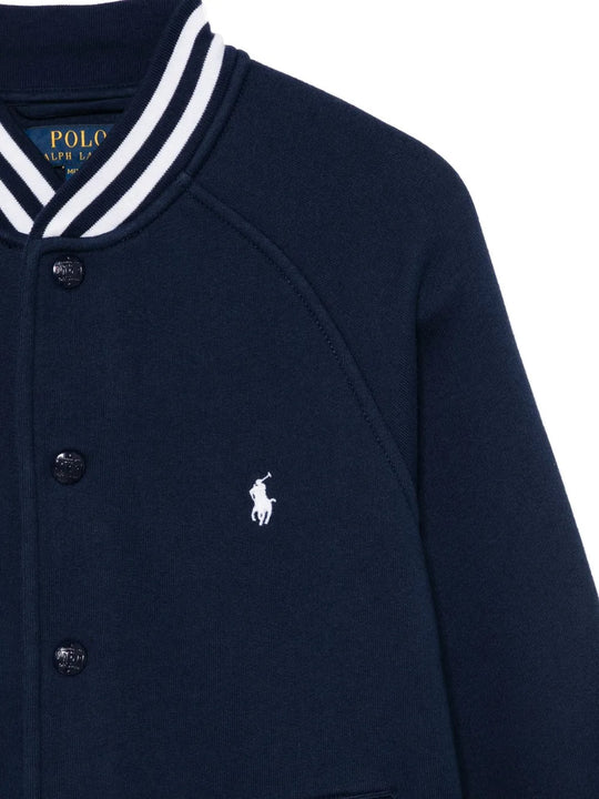 Close up of blue jackets, showing texture of the cotton and polyester fabric