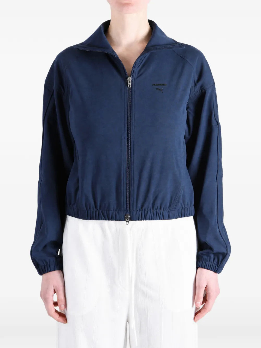 Navy jacket worn by a person, showing the jacket fit