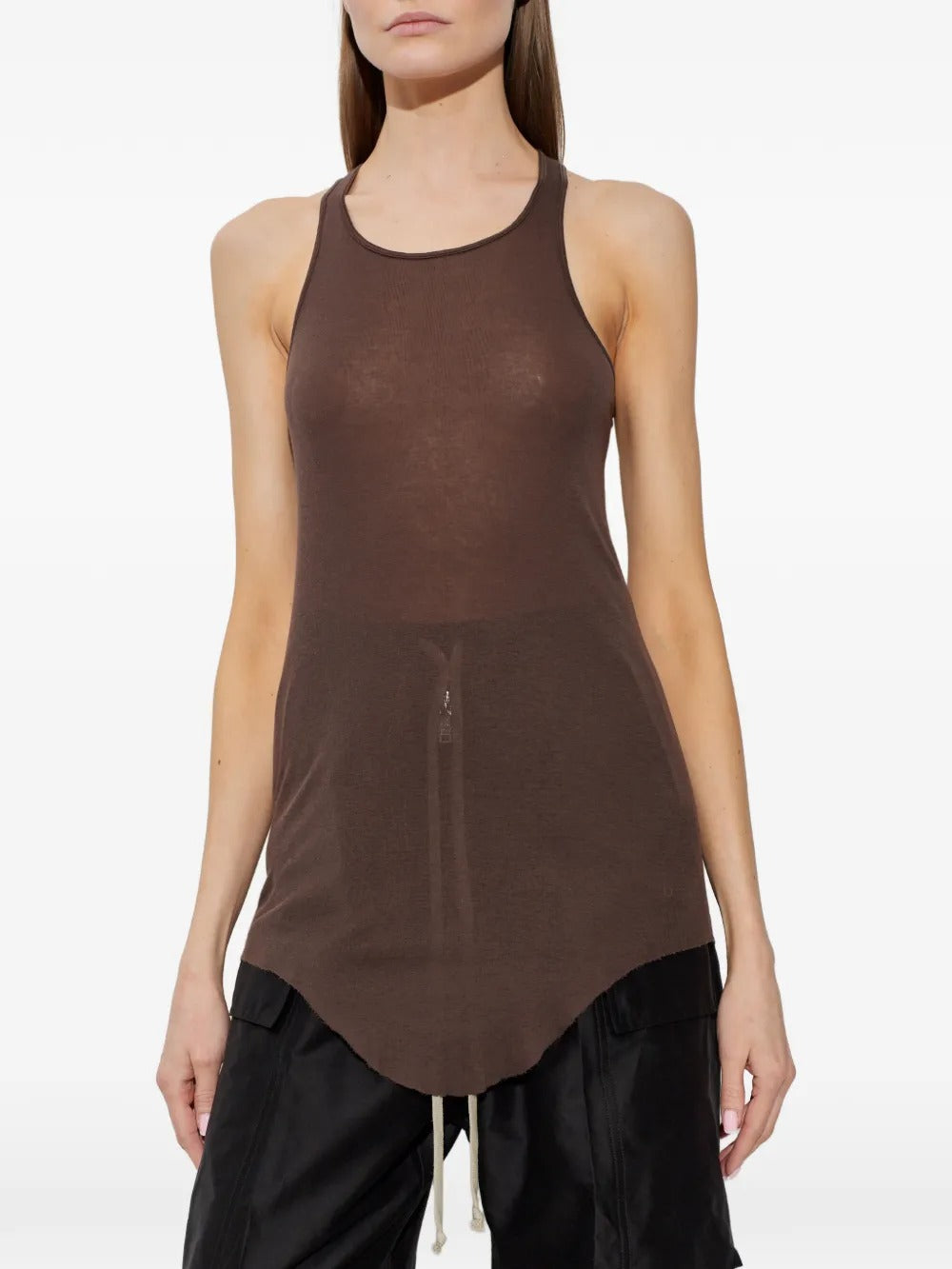Brown tops worn by a person, showing the tops fit